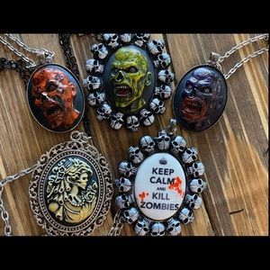 Hand made and painted zombie jewelry